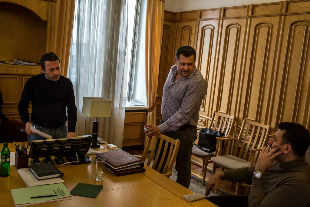 Hennadiy Korban, left, a multimillionaire and new deputy governor, with Mr. Filatov, center, and Vadim Shabanov, right, in the regional administrative building. Credit Mauricio Lima for The New York Times